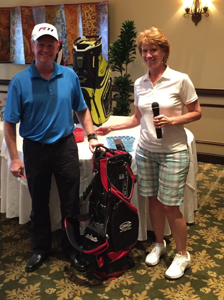 Winner:  Mike Getz, FCI Residential Corp. with Event Organizer Denise Palmatier, SFWMD
