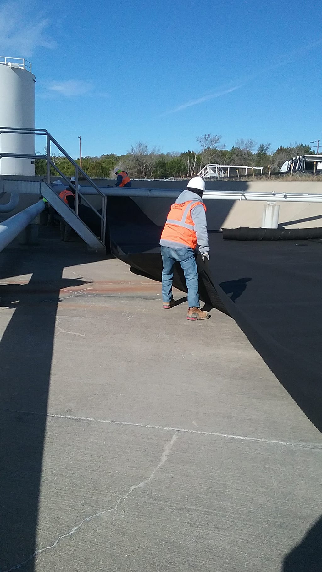 COMANCO Installing Tank Containment Liner in MidTexas COMANCO